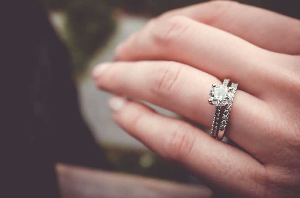Why is the wedding ring often worn on the left hand?